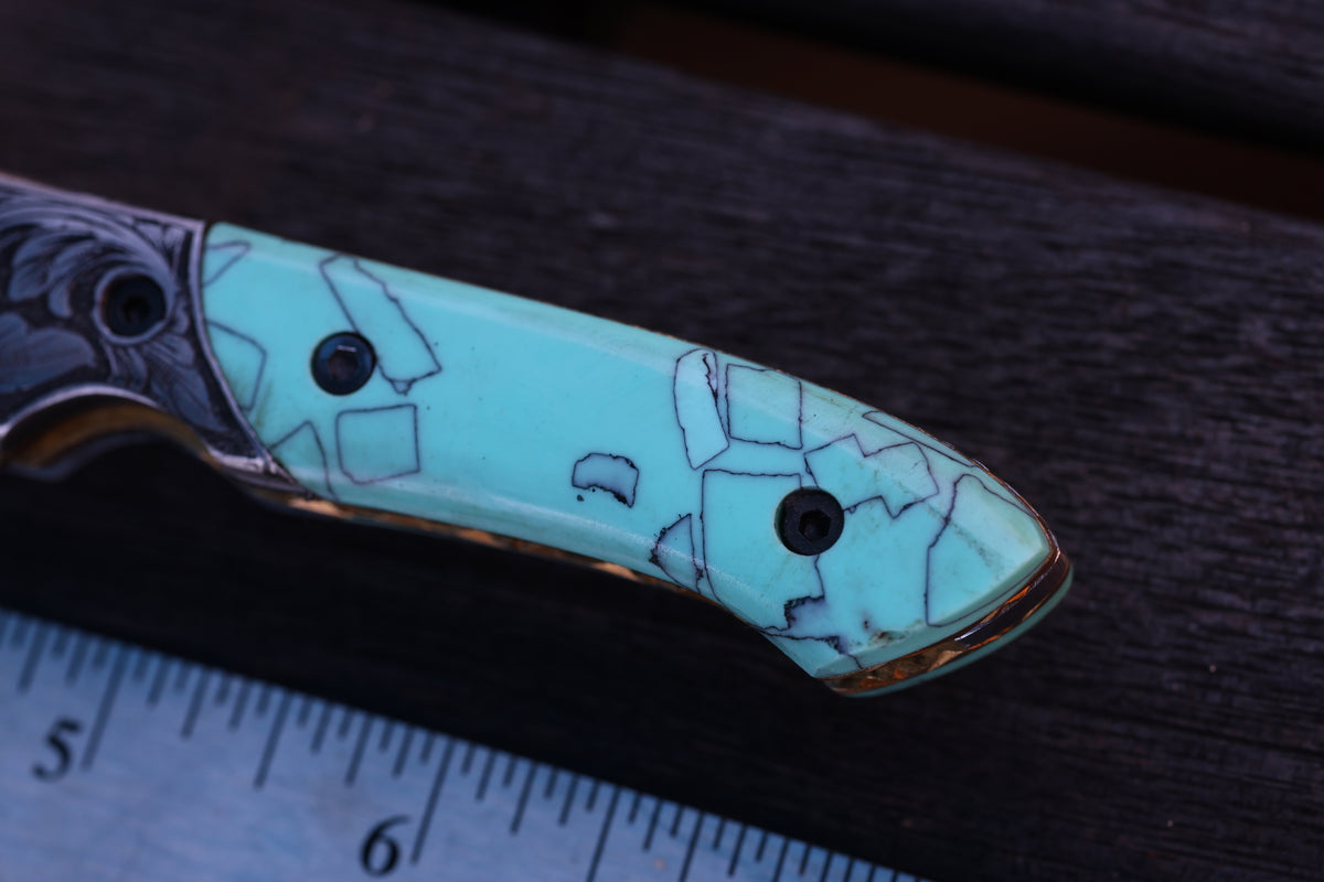 Turquoise Damascus Folding Knife – Hand Engraved Bolster