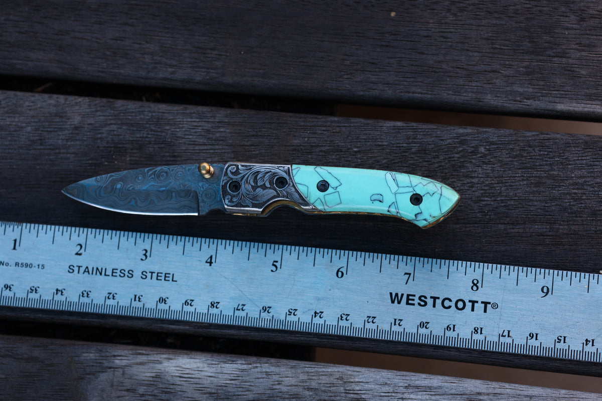 Turquoise Damascus Folding Knife – Hand Engraved Bolster