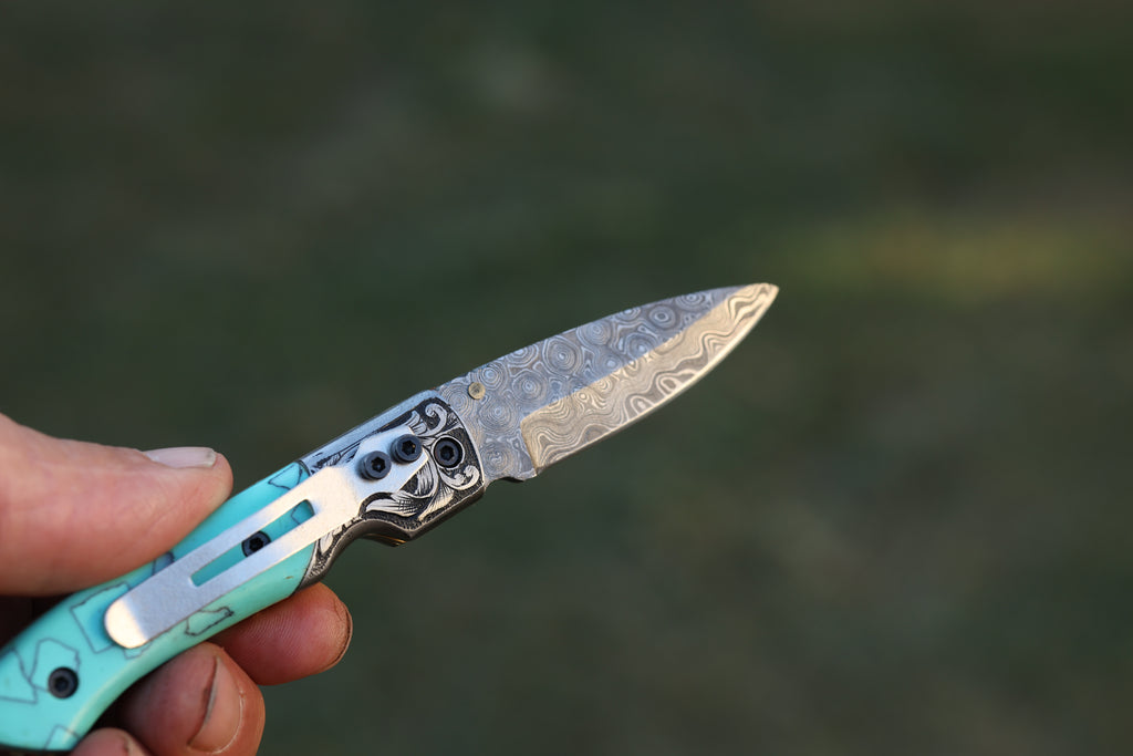 Turquoise Damascus Folding Knife – Hand Engraved Bolster