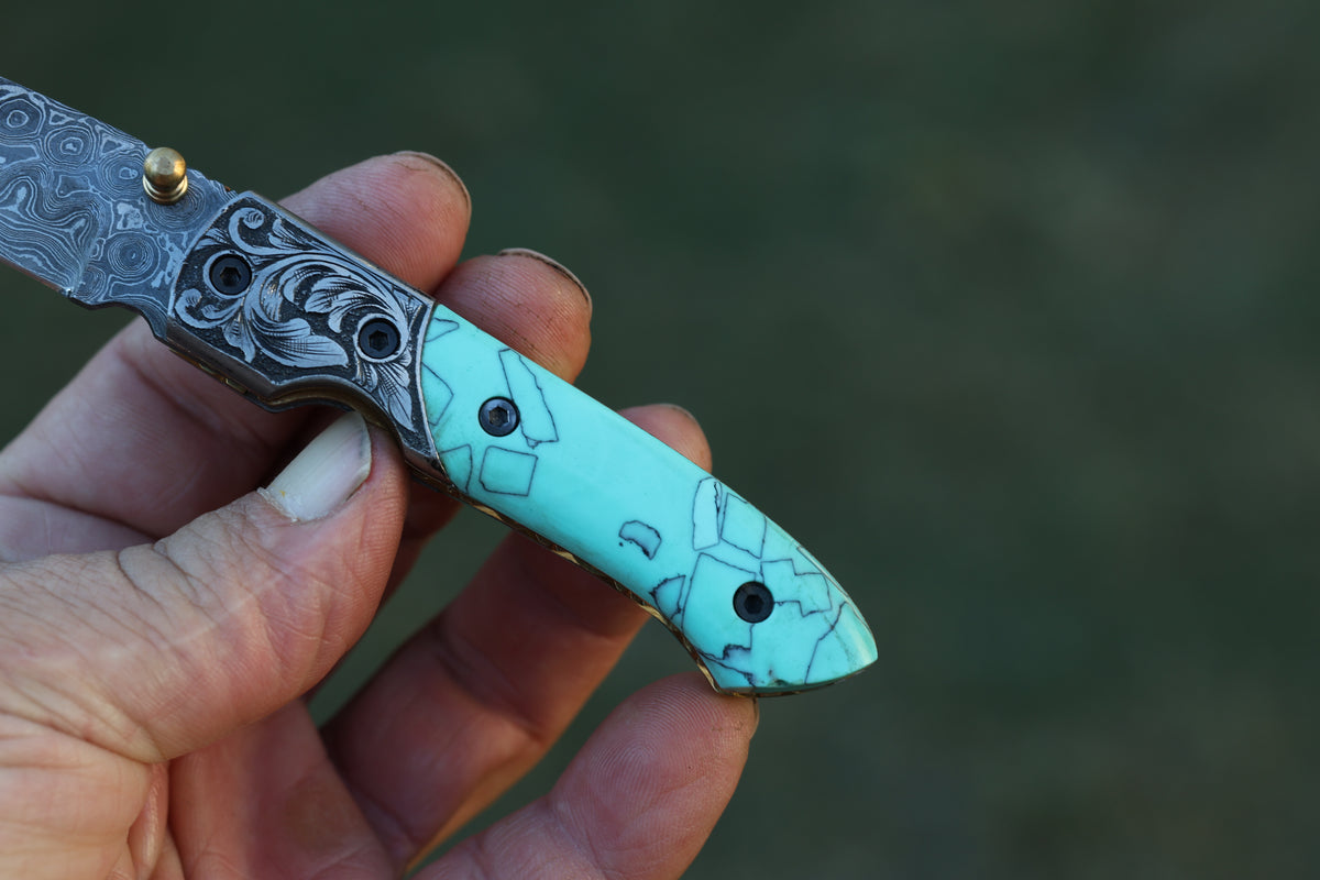 Turquoise Damascus Folding Knife – Hand Engraved Bolster