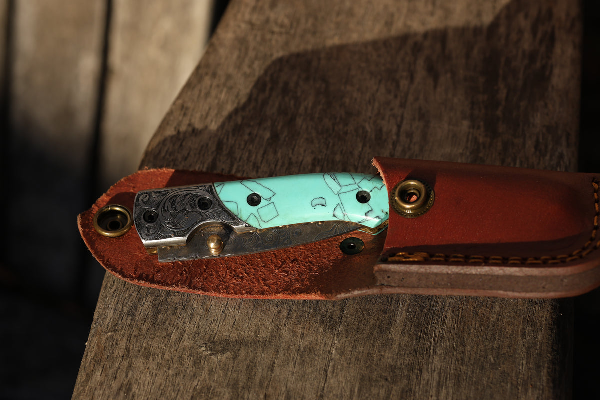 Turquoise Damascus Folding Knife – Hand Engraved Bolster