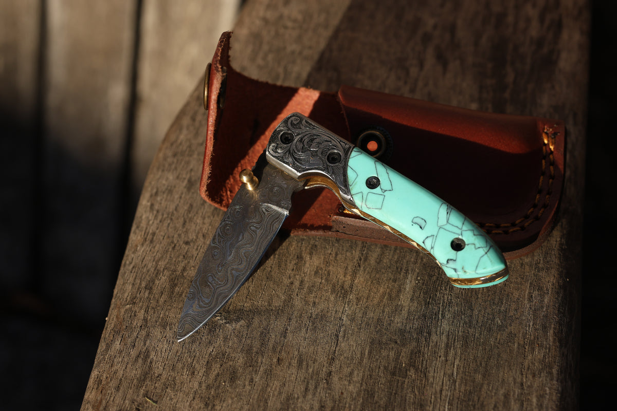 Turquoise Damascus Folding Knife – Hand Engraved Bolster