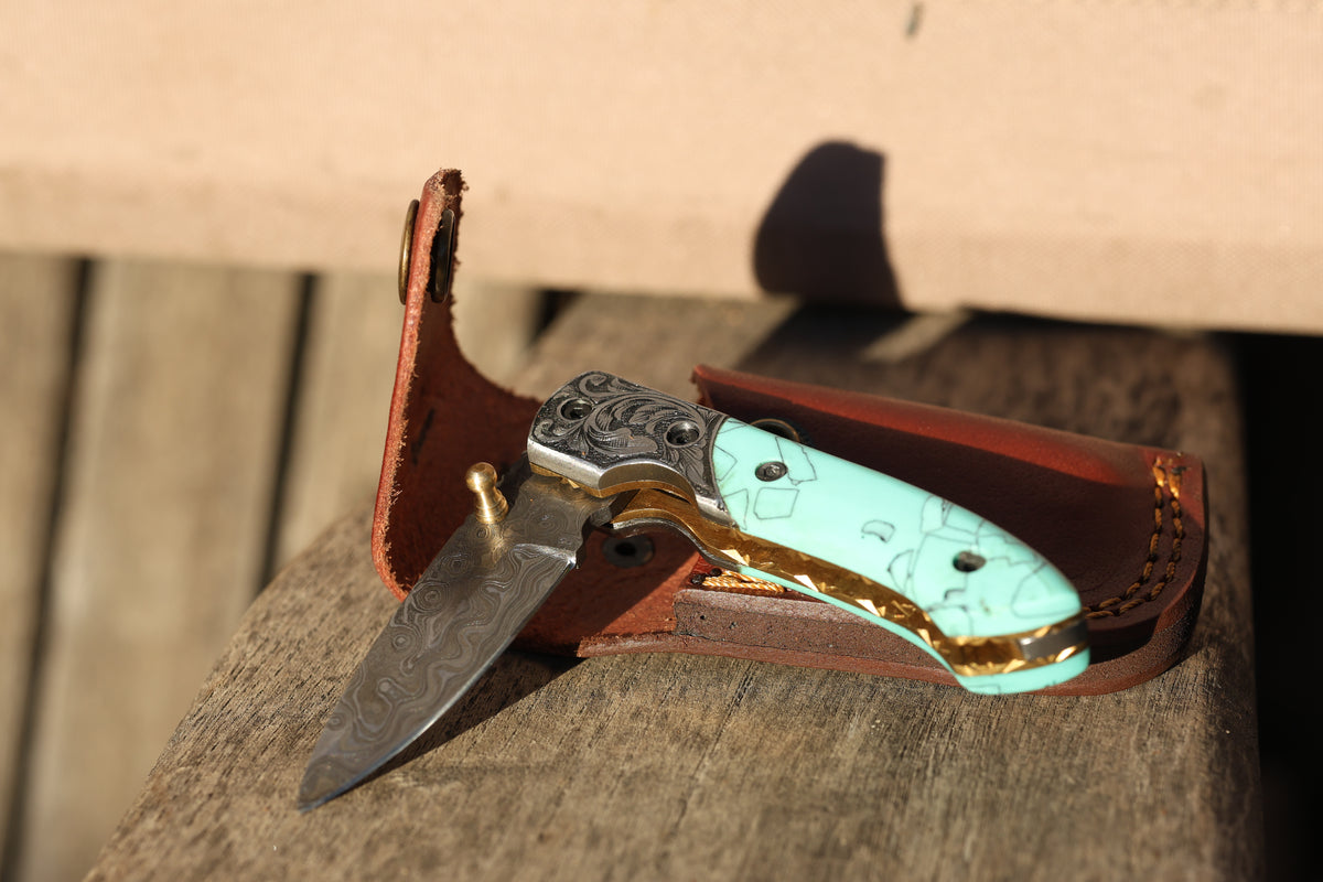 Turquoise Damascus Folding Knife – Hand Engraved Bolster